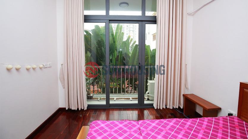 Simple and affordable house for lease in Tay Ho with 3 bedrooms, balcony, terrace